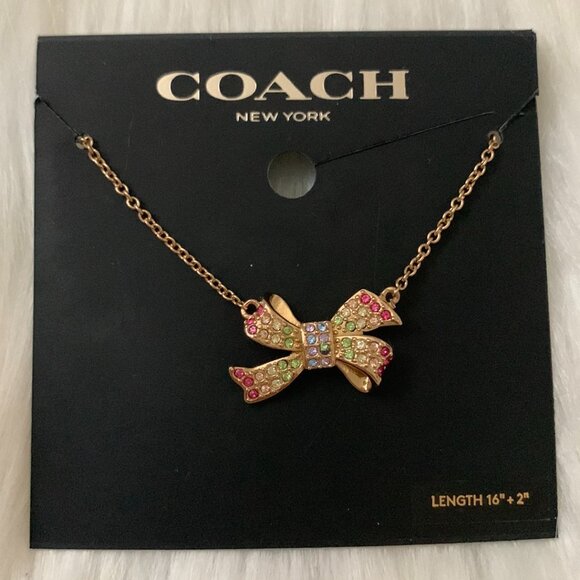 COACH Pave Bow Pendant Necklace in Gold - Picture 1 of 4